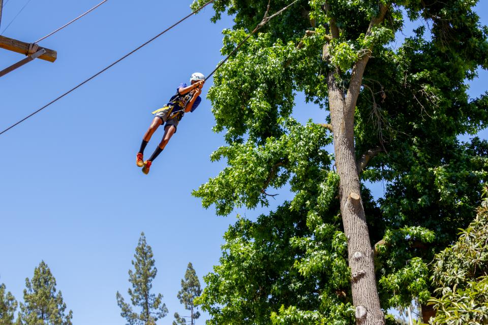 Child on rope swing